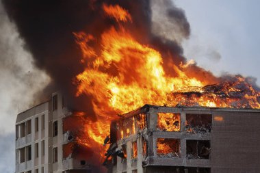 Israel and Iran clash in a conflict affecting civilians in Tel Aviv and Herzliya, with destroyed buildings. USA atack Iran. 18 June 2025