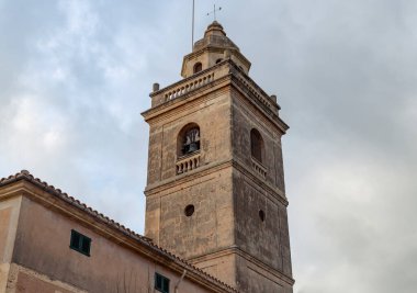 Catholic Christian parish church in the Majorcan town of Ca's Concos at sunset. Island of Mallorca, Spain
