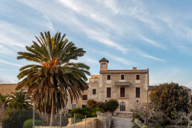 Felanitx, Spain; january 13 2023: Old Mallorcan manor house or possessio at sunset, converted into a luxurious closed rural hotel. Felanitx, island of Mallorca, Spain