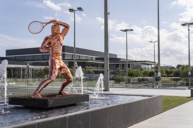 Manacor, Spain; july 01 2023: Metal sculpture of the Spanish tennis player Rafael Nadal at the Rafa Nadal international sports center. Manacor, island of Mallorca, Spain clipart