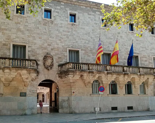 stock image Palma de Mallorca, Spain; august 09 2024: Main facade of the High Court of Justice of the Balearic Islands in the historic center of Palma de Mallorca, a sunny summer morning