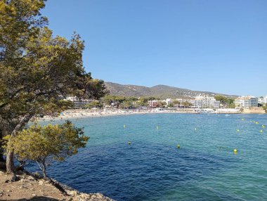 Palmanova, Spain; august 10 2024: General view of Palmanova beach, a summer day with tourists. Island of Mallorca, Spain clipart