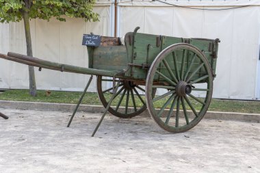 Old horse-drawn carriages on display at the paprika fair. Felanitx, island of Majorca, Spain clipart