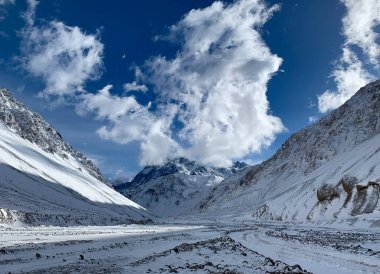 View of the Andes Mountain Range. Shot taken in the Maipo Valley during winter time. clipart