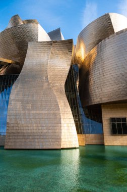 Bilbao, Spain - July 18, 2025: Guggenheim Museum Bilbao Modern Architecture by Water