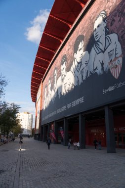 Outside the Ramon Sanchez Pizjuan football stadium of Sevilla FC. Tribute to historic Sevilla FC players on the faade of the stadium.