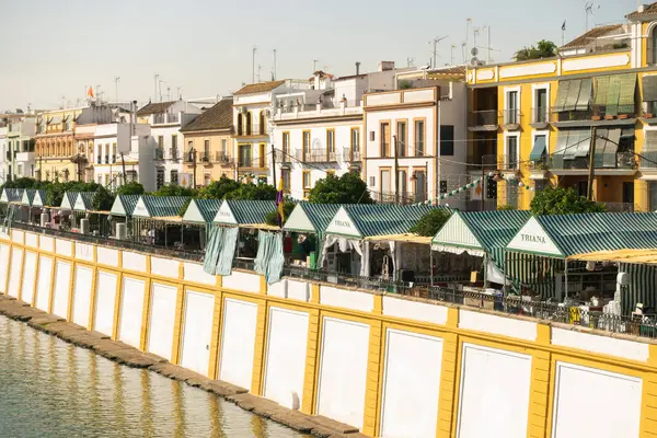 stock image Seville, Spain; July 24th 2024: Stalls of the Vel de Santa Ana in the Triana neighborhood. Fair in the Triana neighborhood. Views of Triana by the Guadalquivir River.