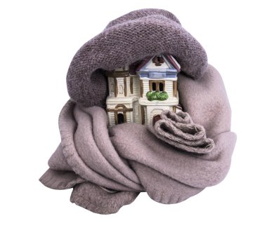 big beautiful ceramic house in a warm hat with a scarf clipart