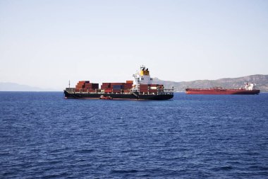 big  cargo ship with containers in the Mediterranean Sea