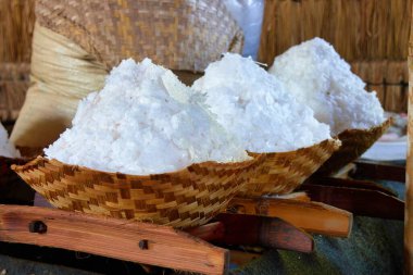 Natural oceanic organic salt mined by hand in Bali village. Traditional sea salt harvesting. clipart