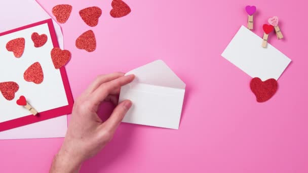 Umschlag Rosa Hintergrund Rosa Valentinstag Feiern Urlaub Top Winkel Draufsicht — Stockvideo