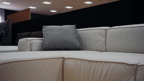 Filmed Frame Approaches Gray Pillow Comfortable White Sofa Video — Vídeo de Stock