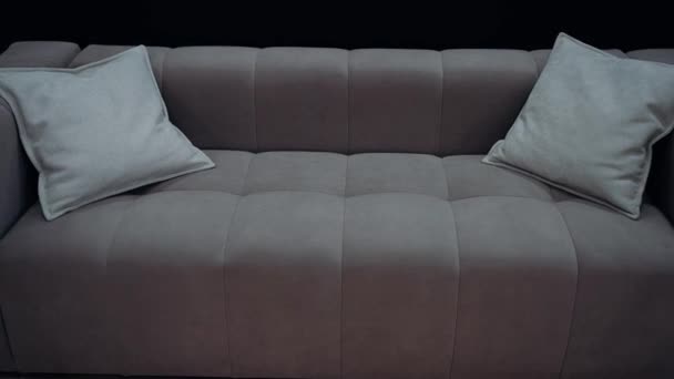 Brown Sofa Medium Beige Cushions Shot Slow Motion Black Background — Vídeos de Stock