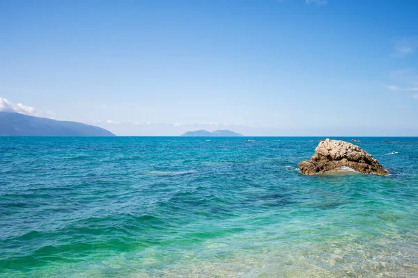 stock image City beach of Vlora resort town, Albania. Summer sunny day. View of the city and the adriatic sea.