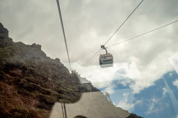 stock image Faja dos Padres, green part and small piece of land in southern coast of Madeira island, Portugal accesible only by cablecar, teleferico from near cliff 250 metres high