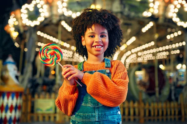 Cute African American Girl Afro Hairstyle Eats Colorful Lollipop Standing — Stock Photo, Image