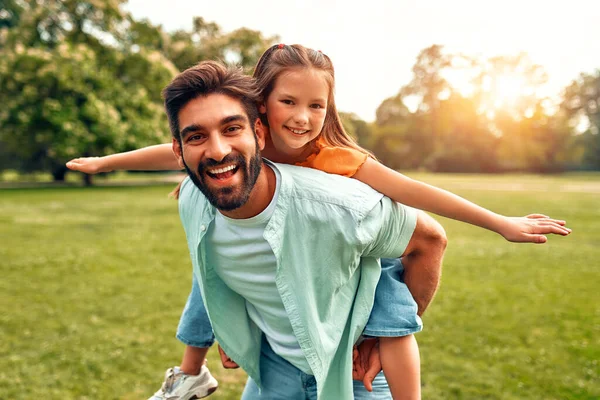 Happy Young Father Playing His Little Daughter Rolling Her His — Stock Photo, Image