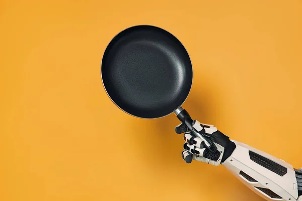 Robot Holding Frying Pan His Hand Isolated Orange Background Concept — Stock Photo, Image