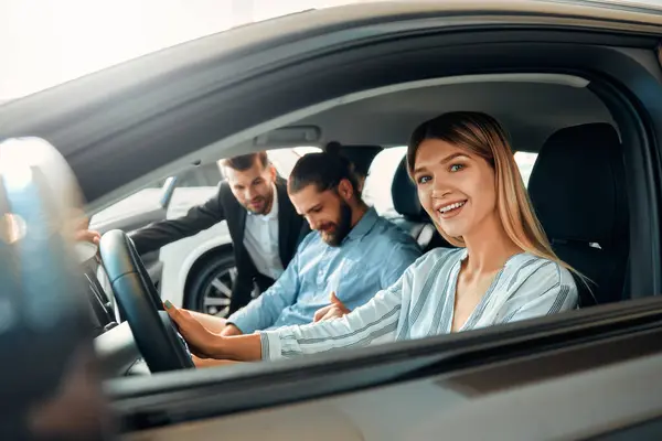 Couple Sitting Car Car Dealership Receiving Advice Salesperson Purchase Rental — Stock Photo, Image