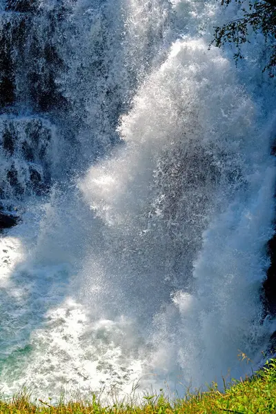 stock image roaring water at a cascade of the Krimml waterfalls at the national park High Tauern in the region pinzgau of Salzburg, Austria