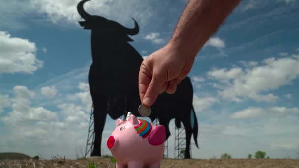 Spaniards Economy Good Growing Man Hand Puts Coins Piggy Bank — Stock Video