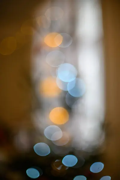 winter solstice blur background with bokeh rings green calming colors