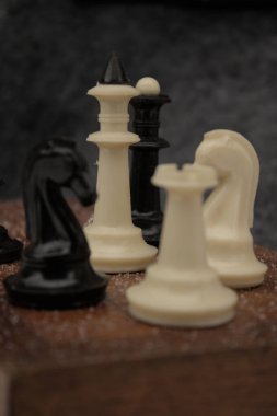 vintage beautiful wooden chess on gray background