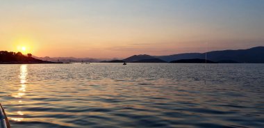 Dramatic Seascape Sunrise , Hills in the Background, Adriatic Sea, Croatia