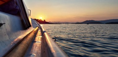Panoramic Seascape Sunrise From a Boat, Hills in the Background, Adriatic Sea, Croatia
