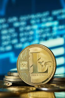 Litecoin altın kripto para birimi ve mavi grafik arkaplanı