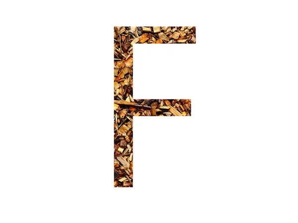 字母F的字母F 用褐色的碎木片制成 用白色背景隔开 — 图库照片