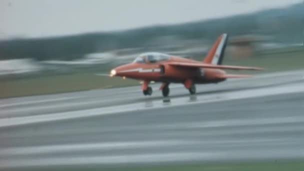 Red Military Training Plane Lands Rainy Day Folland Gnat Red — Vídeos de Stock