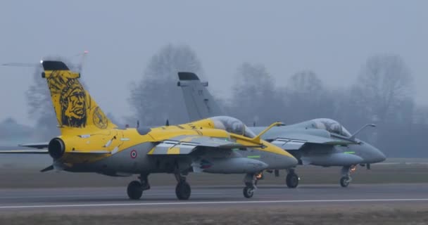 Two Military Planes Taxi Runway Landing Foggy Winter Evening Military — Stock Video