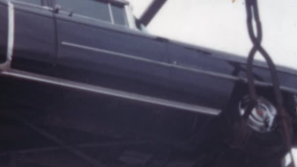 Cadillac Fleetwood 1950 Годов Close Port Unloaded Ship Crane Attached — стоковое видео