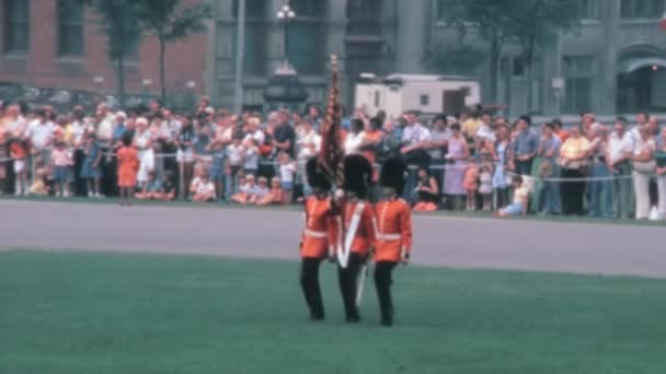 Three Royal Canadian Mounted Police Guards Flag Raising Legs Simultaneously — Stockvideo