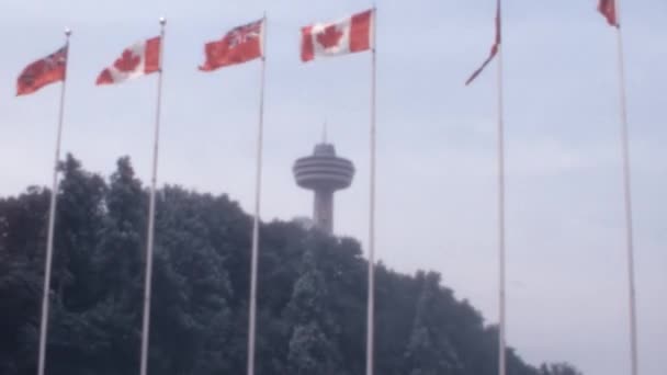1970S Vintage Video Canadian Ontario Flags Waving Top Flagpoles Niagara — Stock Video