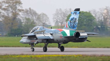 Istrana Italy April 5 2024: Combat Aircraft of NATO Taxiing on Military Air Base Runway. AMX Ghibli of Italian Air Force. Copy Space clipart