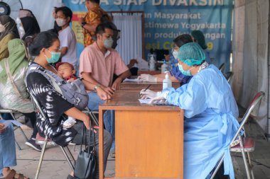 Covid-119 aşı destekçisi Yogyakarta 'da, 25 Şubat 2023
