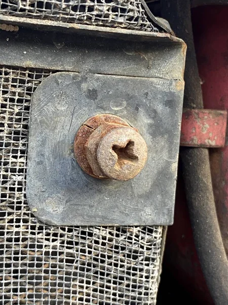 stock image old rusty bolt on machine