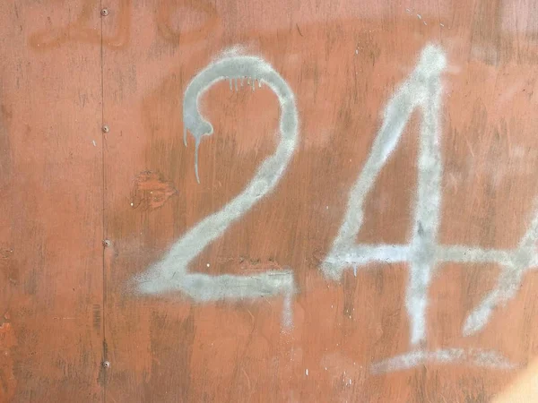 number two of numbers on a wooden background