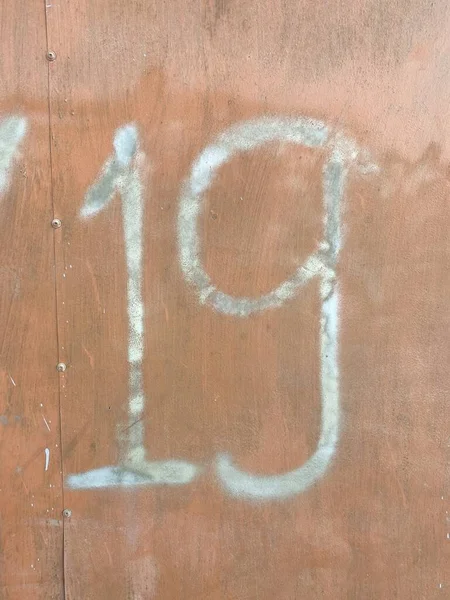 壁の数字は家の形で描かれアメリカの困窮した状態で書かれています — ストック写真