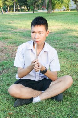 cute boy in nature garden