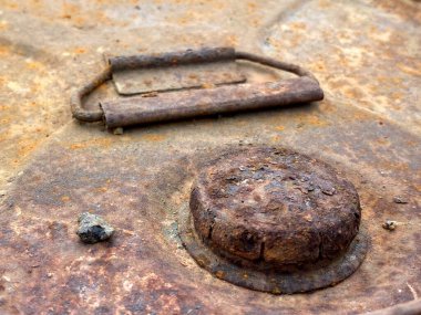 old rusty iron handle on the street