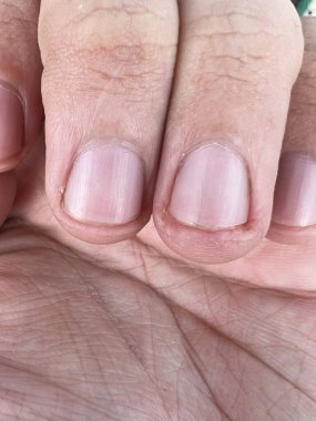 close up of a female hand with a pedicure