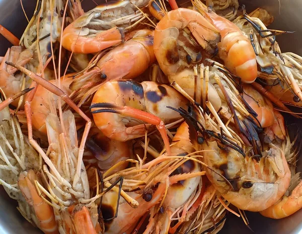 stock image grilled shrimps on wooden background