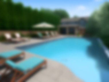 Mavi suyu olan güzel bir yüzme havuzu..