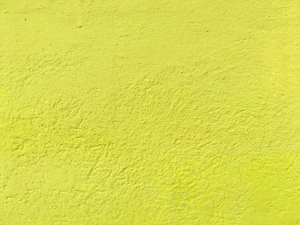 背景のための黄色いセメントの壁の質の使用 — ストック写真