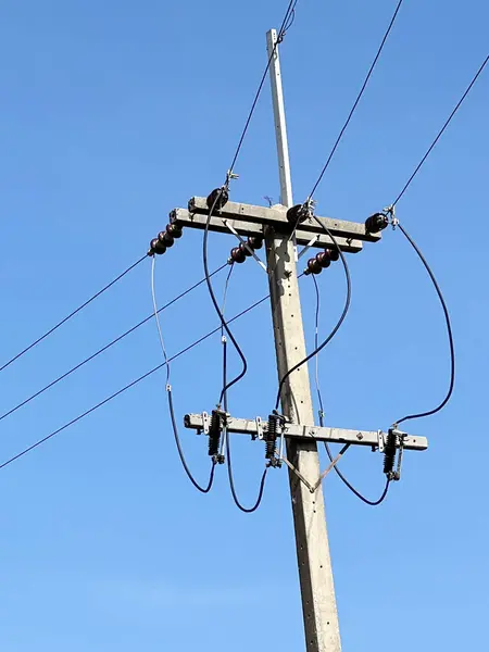 high voltage power line against blue sky. high quality photo