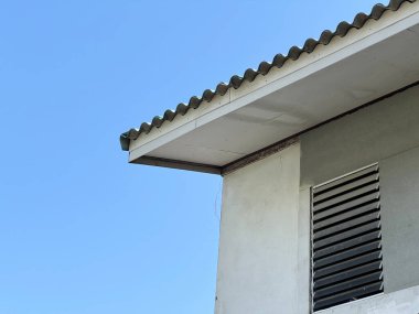 house with a chimney on the roof.