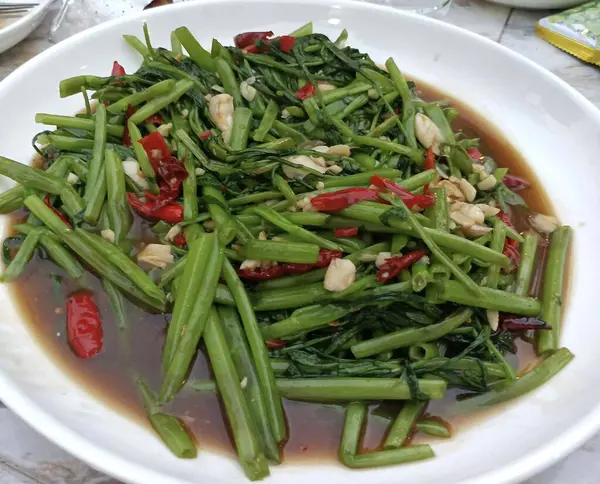 stir fried water spinach with vegetables and spices